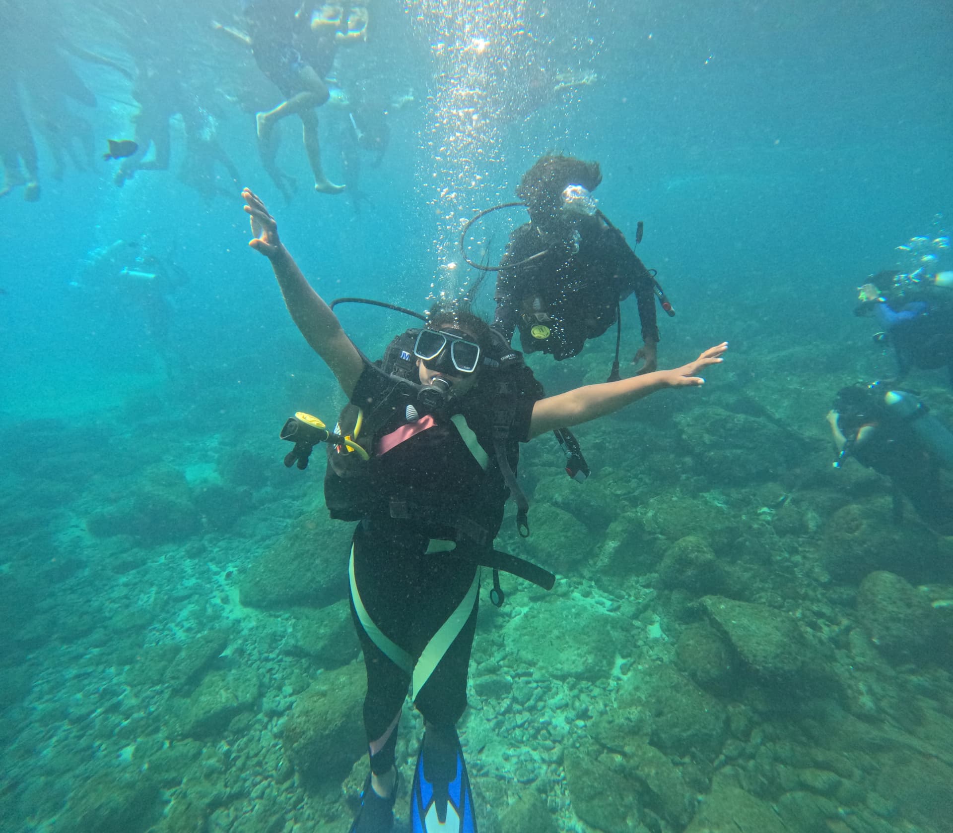 Scuba diver exploring vibrant coral reef formations at Netrani Island with Netrani Scuba Dive